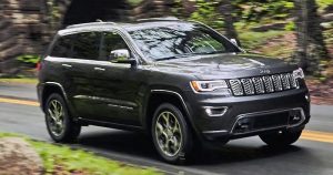 2021 Jeep Grand Cherokee Driving Down a Road