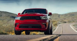 Red 2021 Dodge Durango Driving down the Highway